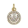 Guldfarvet charm-vedhæng med smiley fyldt med bling Ø12 mm