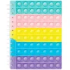Notesbog Pop it – forside med farvestrålende fidget toy pop its! 16×20 cm, 90 ark