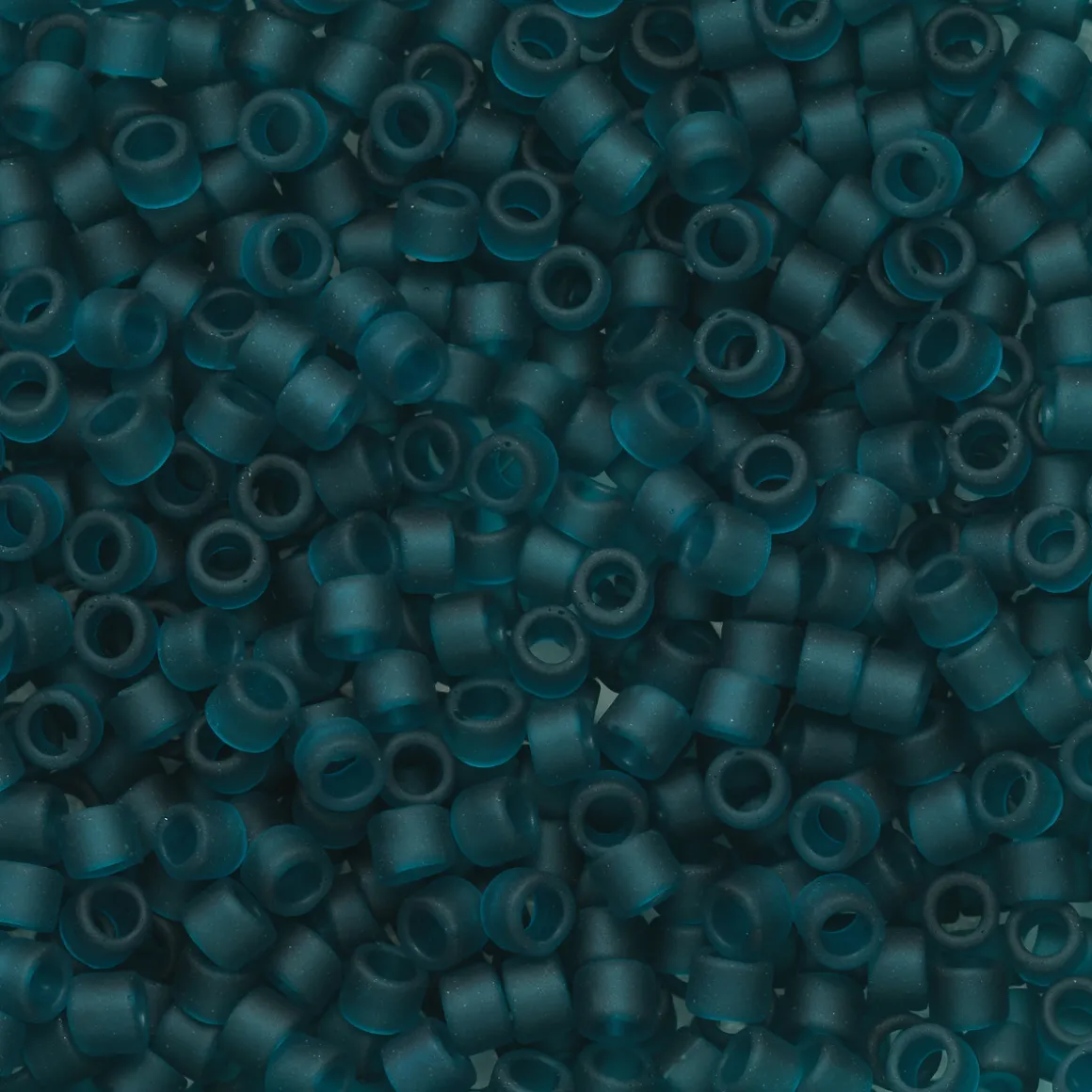 TOHO-perler 11/0 – petrol mat, 7BDF Transparent frosted teal
