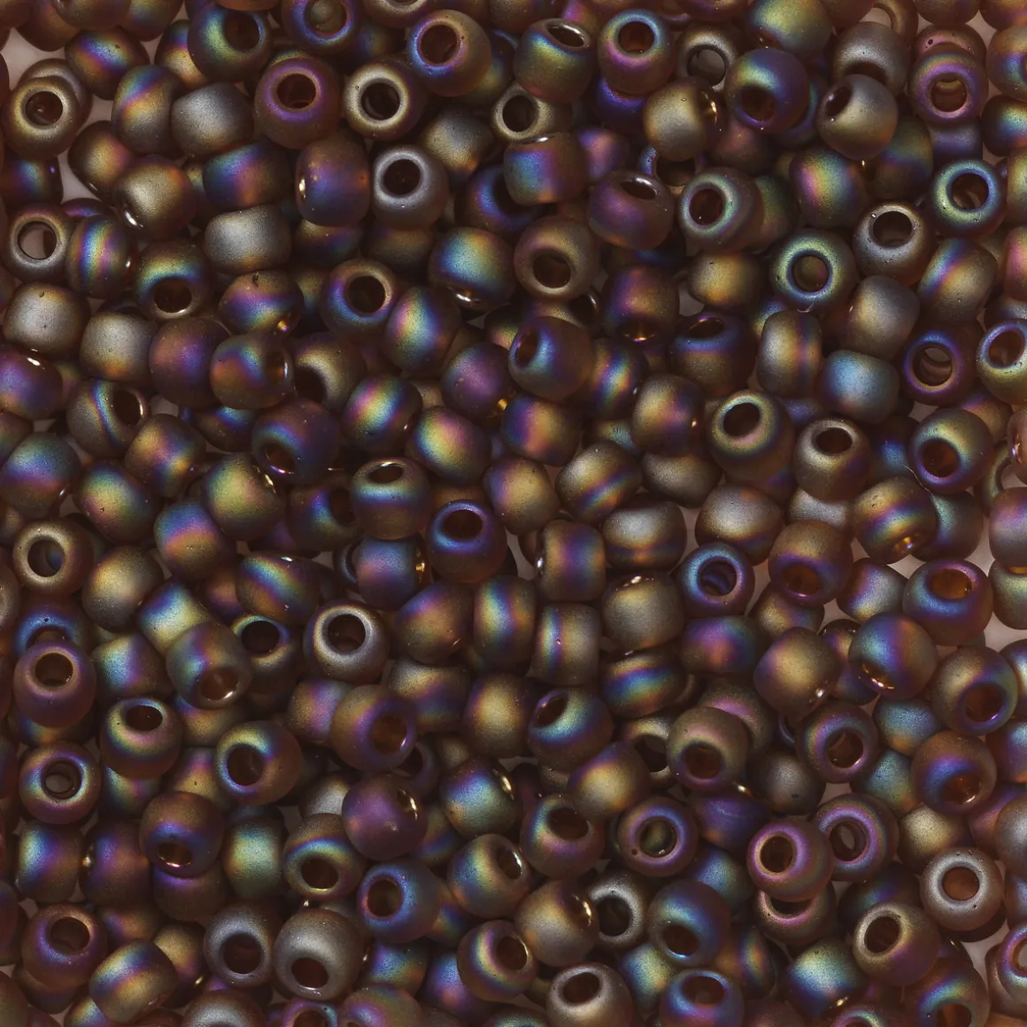 TOHO-perler runde 11/0 – blåbrun, 177F Transparent rainbow frosted smoky topaz