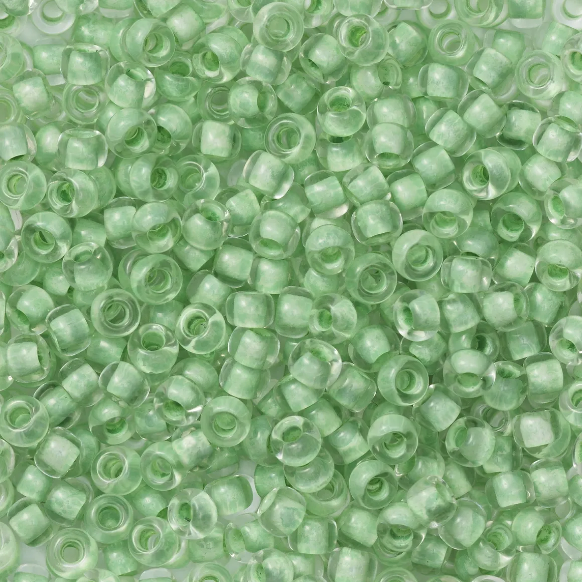 TOHO-perler runde 11/0 – æblegrøn, 975 Neon sea foam lined crystal