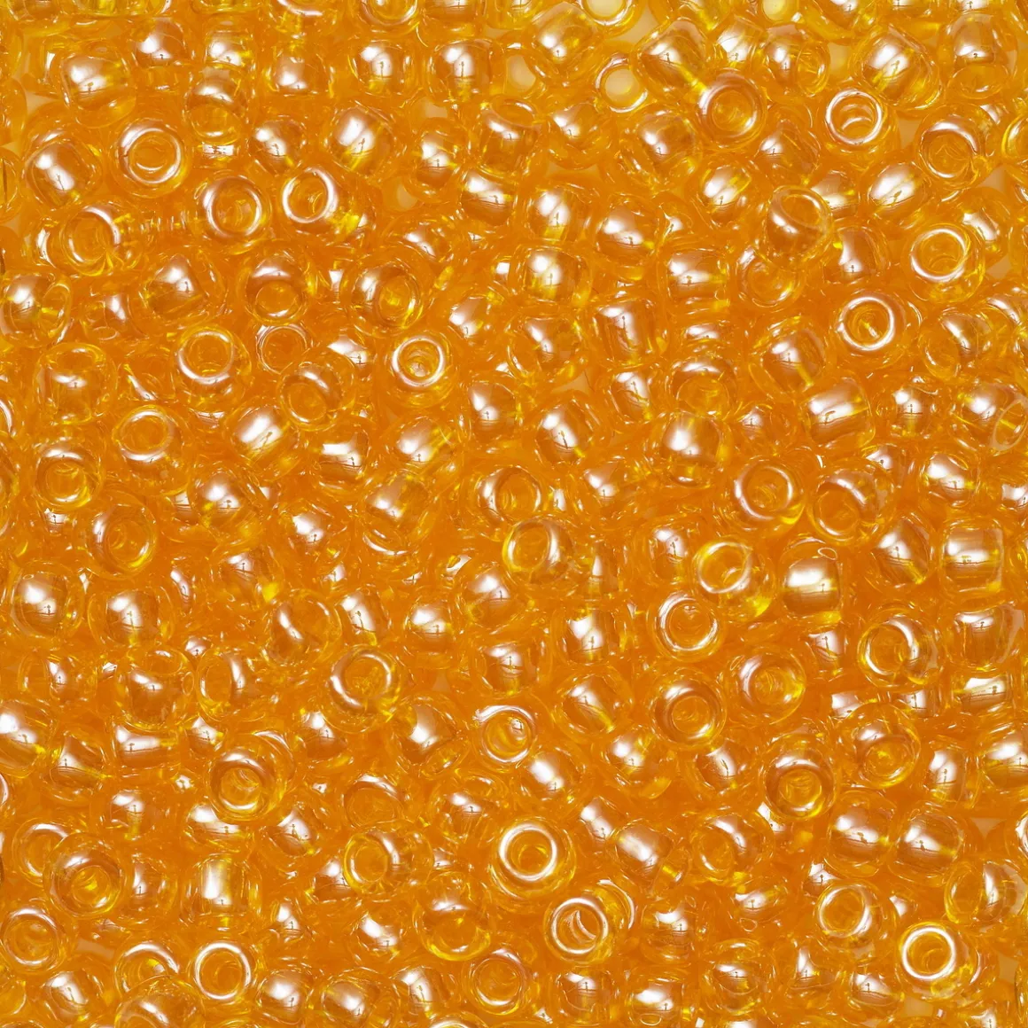 TOHO-perler runde 11/0 – gulorange, 111 Transparent lustered light hyacinth