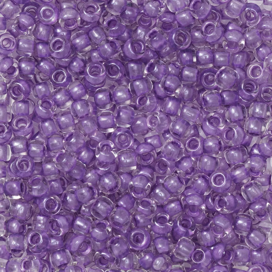 TOHO-perler runde 11/0 – lyslilla, 935 Purple lined crystal